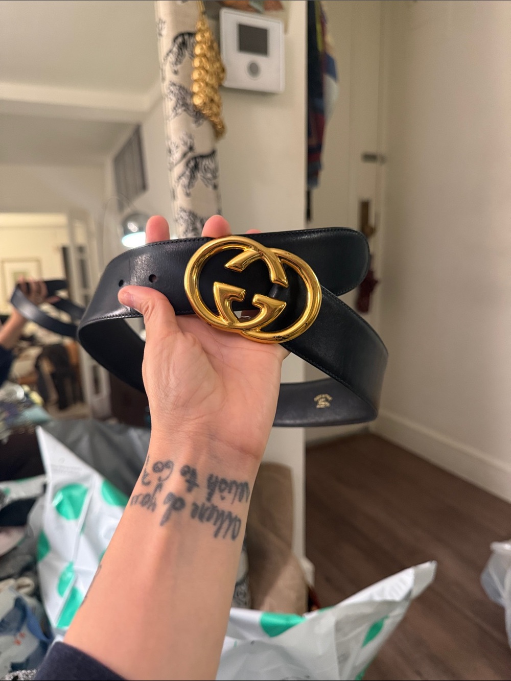 Gucci Black Leather Belt with Gold Interlocking GG Buckle